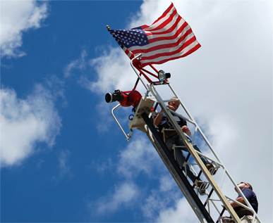 Jamesburg Fire Fighters Hang Flag at Middlesex County Fair